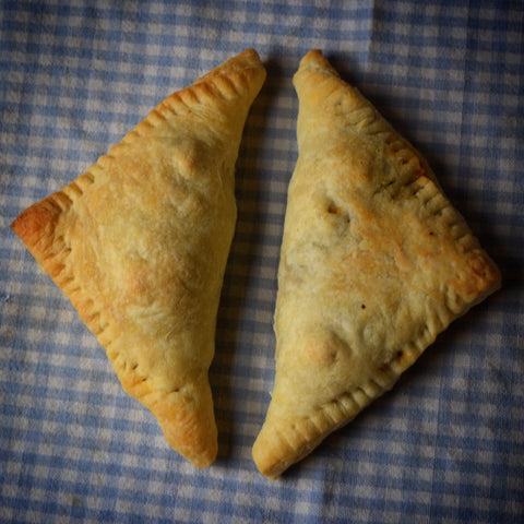Garlicky Greens & Goat Cheese Hand Pies